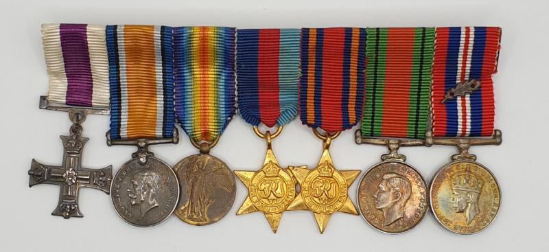 WWI and WWII Military Cross Gallantry 7 Place miniature mounted group.