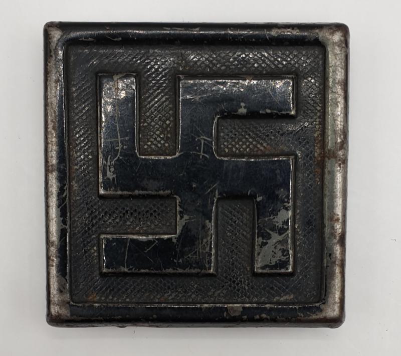 Swastika belt buckle.