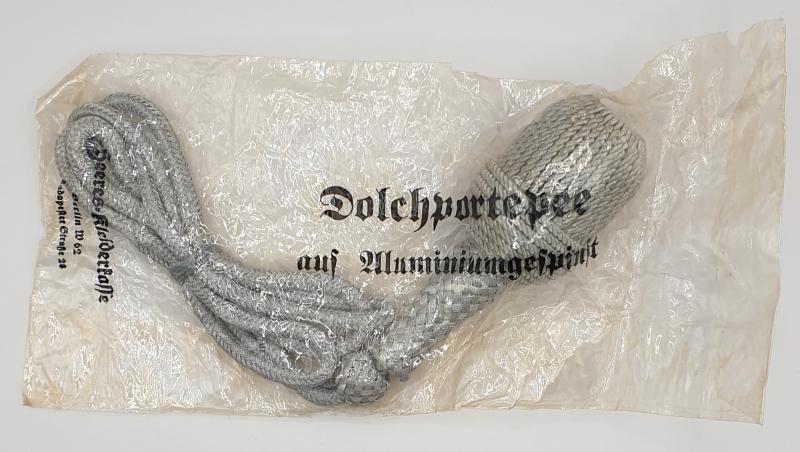 Heer officer dagger portepee in original Kleiderklasse cellophane packet.