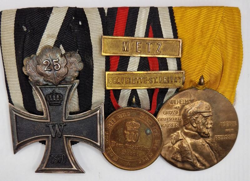 1870 Iron Cross Second Class with 25 year Anniversary Oakleaves on 3 place medal bar.
