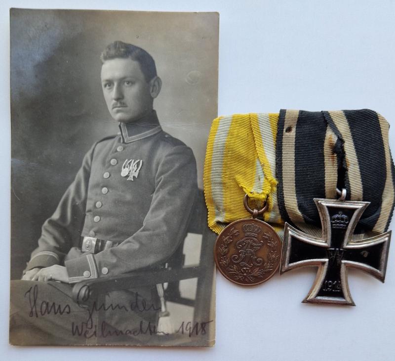 1918 dated photo postcard with original two place Iron Cross medal bar.