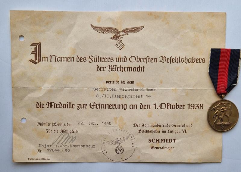 Sudetenland medal with 1940 dated citation to a Luftwaffe Flak soldier.
