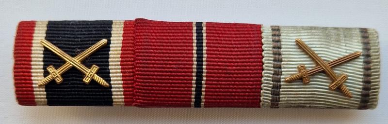 Large 3 place ribbon bar KVKII with Swords, Ostmedaille and Bulgarian Bravery Medal.