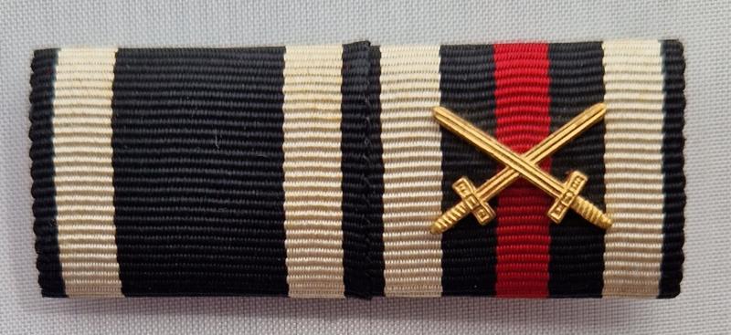 Large size 1914 Iron Cross Second Class and Hindenburg Cross for combatants double ribbon bar.